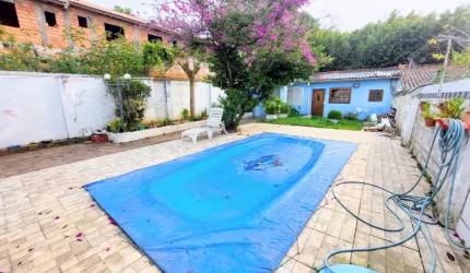 Casa em condomínio fechado com 3 quartos à venda na Rua Sebastião Wolf, 181, Nonoai, Porto Alegre, 180 m2 por R$ 868.900