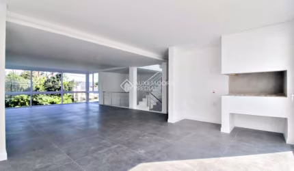 Casa em condomínio fechado com 3 quartos à venda na Rua Ivo Walter Kern, 599, Hípica, Porto Alegre, 256 m2 por R$ 1.699.900