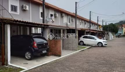 Casa em condomínio fechado com 2 quartos à venda na Rua Alcebíades Ribeiro, 219, Aberta dos Morros, Porto Alegre, 85 m2 por R$ 172.000