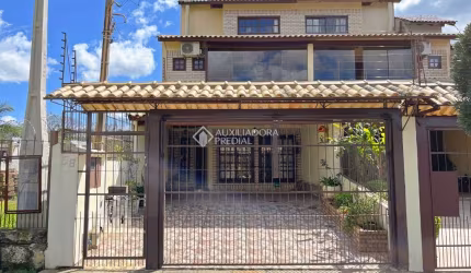 Casa com 4 quartos à venda na Rua Doutor Egydio Michaelsen, 58, Cavalhada, Porto Alegre, 202 m2 por R$ 655.000
