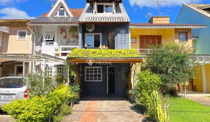 Casa em condomínio fechado com 3 quartos à venda na Avenida Juca Batista, 1458, Cavalhada, Porto Alegre, 132 m2 por R$ 595.000