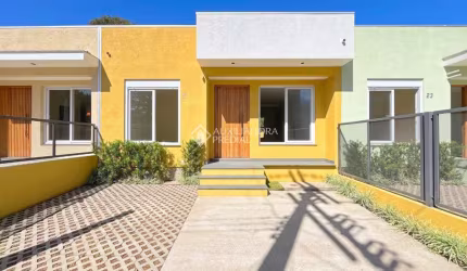 Casa com 3 quartos à venda na Rua Criciúma, 23, Guarujá, Porto Alegre, 69 m2 por R$ 425.000