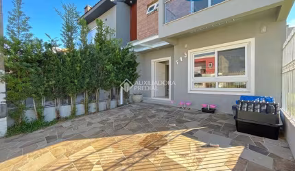 Casa em condomínio fechado com 3 quartos à venda na Rua Aldo Sani, 143, Hípica, Porto Alegre, 127 m2 por R$ 700.000