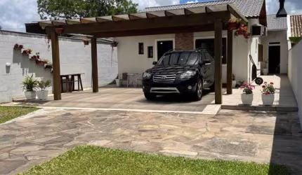 Casa com 3 quartos à venda na Rua Stringhini, 99, Hípica, Porto Alegre, 154 m2 por R$ 595.000