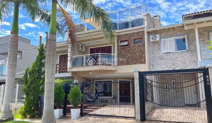 Casa com 3 quartos à venda na Rua Guatambu, 618, Hípica, Porto Alegre, 254 m2 por R$ 830.000