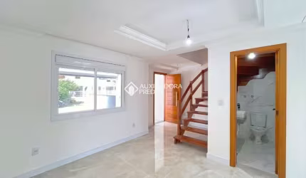 Casa em condomínio fechado com 3 quartos à venda na Rua Guatambu, 481, Hípica, Porto Alegre, 138 m2 por R$ 999.000