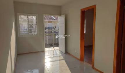 Casa em condomínio fechado com 2 quartos para alugar na Estrada Costa Gama, 5850, Hípica, Porto Alegre, 49 m2 por R$ 1.300