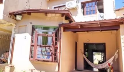 Casa em condomínio fechado com 3 quartos para alugar na Rua Baldoino Bottini, 76, Hípica, Porto Alegre, 145 m2 por R$ 3.190