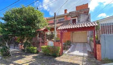 Casa com 3 quartos à venda na Rua Marcos Wainstein, 30, Vila Nova, Porto Alegre, 200 m2 por R$ 480.000