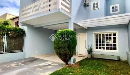 Casa com 3 quartos à venda na Rua Felipe Arísio, 96, Hípica, Porto Alegre, 168 m2 por R$ 780.000
