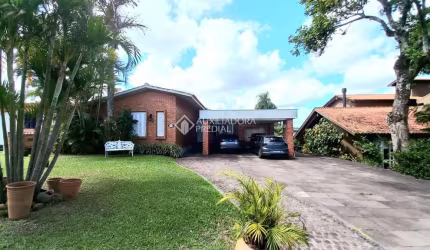 Casa em condomínio fechado com 5 quartos à venda na Avenida Firmino Octávio Bimbi, 255, Cavalhada, Porto Alegre, 274 m2 por R$ 1.390.000