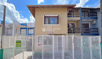 Casa com 3 quartos à venda na Rua Romano Rolando Botin, 146, Hípica, Porto Alegre, 200 m2 por R$ 550.000