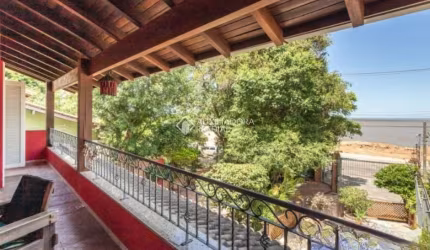Casa com 4 quartos à venda na Avenida Guaíba, 10660, Ipanema, Porto Alegre, 250 m2 por R$ 1.350.000