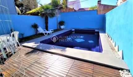 Casa em condomínio fechado com 3 quartos à venda na Rua Carlos Scliar, 99, Hípica, Porto Alegre, 183 m2 por R$ 696.900