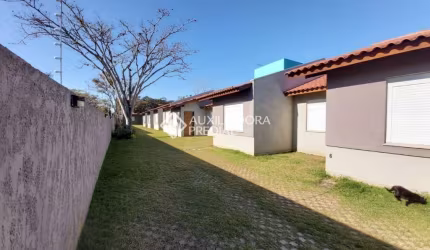 Casa em condomínio fechado com 2 quartos à venda na Rua Santa Mônica, 404, Ponta Grossa, Porto Alegre, 60 m2 por R$ 210.000