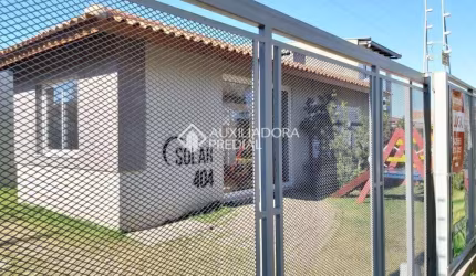 Casa em condomínio fechado com 2 quartos à venda na Rua Santa Mônica, 404, Ponta Grossa, Porto Alegre, 60 m2 por R$ 212.000