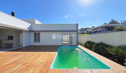 Casa em condomínio fechado com 3 quartos à venda na Estrada das Três Meninas, 1501, Vila Nova, Porto Alegre, 339 m2 por R$ 2.099.000
