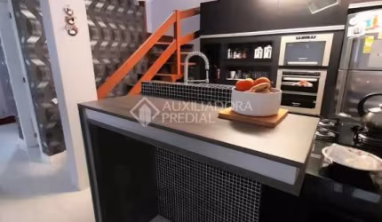 Casa em condomínio fechado com 3 quartos à venda na Rua Roberto Santini, 44, Hípica, Porto Alegre, 129 m2 por R$ 693.990