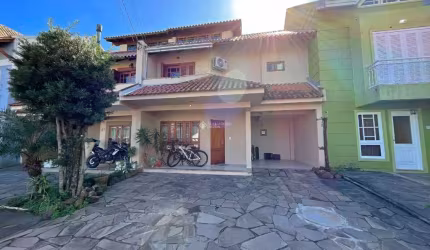 Casa em condomínio fechado com 3 quartos à venda na Avenida Juca Batista, 1458, Cavalhada, Porto Alegre, 153 m2 por R$ 749.000