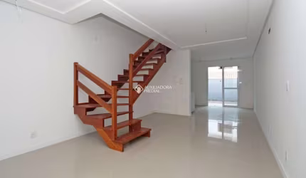 Casa em condomínio fechado com 3 quartos à venda na Rua Doutor Cláudio Walter Ferreira da Silva, 251, Guarujá, Porto Alegre, 128 m2 por R$ 450.000