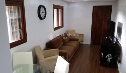 Casa em condomínio fechado com 3 quartos à venda na Rua Reinaldo Muller, 502, Ponta Grossa, Porto Alegre, 65 m2 por R$ 320.000