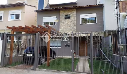 Casa em condomínio fechado com 3 quartos à venda na Rua Henrique Anawate, 590, Guarujá, Porto Alegre, 240 m2 por R$ 850.000