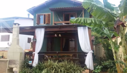 Casa em condomínio fechado com 4 quartos à venda na Rua Décio Pelegrini, 55, Ipanema, Porto Alegre, 187 m2 por R$ 600.000