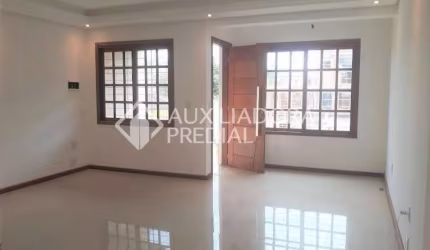 Casa em condomínio fechado com 3 quartos à venda na Rua Itacyr Rossi, 10, Cavalhada, Porto Alegre, 120 m2 por R$ 490.000