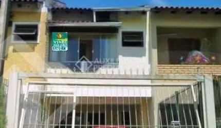Casa em condomínio fechado com 2 quartos à venda na Rua Santos Zottis, 160, Hípica, Porto Alegre, 132 m2 por R$ 350.000