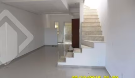 Casa em condomínio fechado com 3 quartos à venda na Avenida Vereador Roberto Landell de Moura, 328, Campo Novo, Porto Alegre, 101 m2 por R$ 345.000