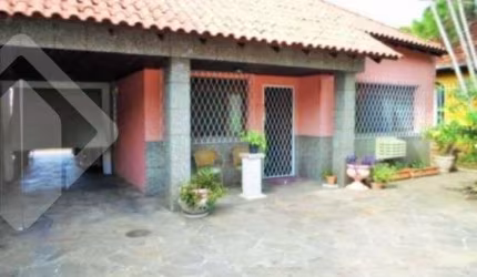 Casa em condomínio fechado com 5 quartos à venda na Rua Criciúma, 73, Guarujá, Porto Alegre, 220 m2 por R$ 453.000