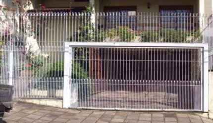 Casa em condomínio fechado com 3 quartos à venda na Rua João Bonuma, 48, Coronel Aparício Borges, Porto Alegre, 326 m2 por R$ 1.200.000