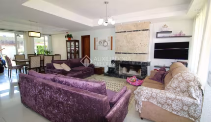 Casa em condomínio fechado com 5 quartos à venda na Rua Ivo Walter Kern, 599, Hípica, Porto Alegre, 332 m2 por R$ 2.064.000