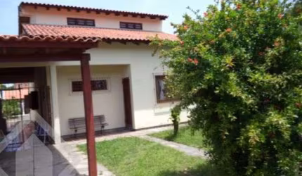 Casa em condomínio fechado com 4 quartos à venda na Travessa Alfredo Magalhães, 81, Cavalhada, Porto Alegre, 240 m2 por R$ 930.000