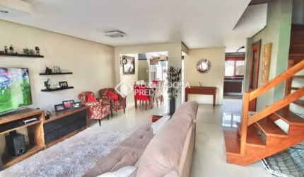 Casa em condomínio fechado com 3 quartos à venda na Rua Roberto Santini, 94, Hípica, Porto Alegre, 140 m2 por R$ 615.000