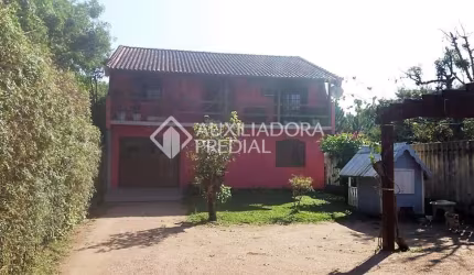 Terreno em condomínio fechado à venda na Avenida João Antônio Silveira, 1064, Restinga, Porto Alegre por R$ 799.000