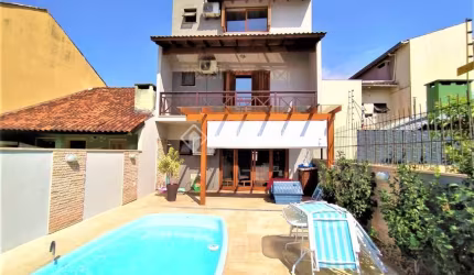 Casa com 3 quartos à venda na Rua Romano Rolando Botin, 155, Hípica, Porto Alegre, 141 m2 por R$ 689.000