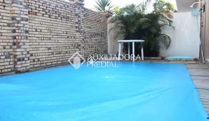 Casa em condomínio fechado com 3 quartos à venda na Avenida Juca Batista, 473, Cavalhada, Porto Alegre, 98 m2 por R$ 380.000