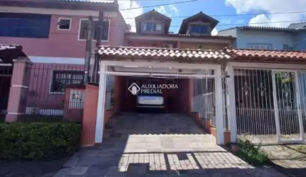 Casa com 3 quartos à venda na Rua James Bocacio, 116, Hípica, Porto Alegre, 123 m2 por R$ 450.000