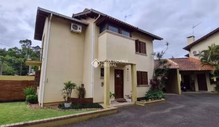 Casa em condomínio fechado com 3 quartos à venda na Rua Antônio José Cavasotto, 95, Ideal, Novo Hamburgo, 140 m2 por R$ 650.000
