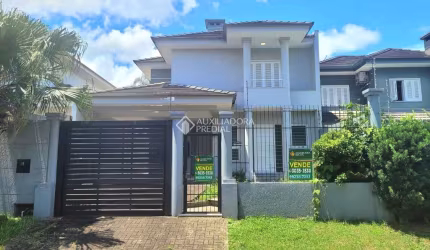 Casa com 3 quartos à venda na Rua Barão de Santo Ângelo, 1380, Hamburgo Velho, Novo Hamburgo, 126 m2 por R$ 699.000