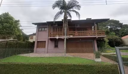Casa com 4 quartos à venda na Rua Tubarão, 433, Primavera, Novo Hamburgo, 267 m2 por R$ 790.000