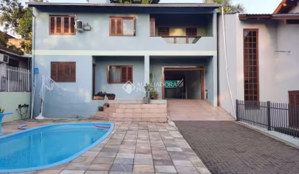 Casa com 4 quartos à venda na Rua Canela, 110, Ouro Branco, Novo Hamburgo, 242 m2 por R$ 750.000