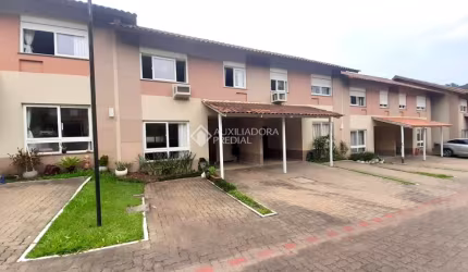 Casa em condomínio fechado com 3 quartos à venda na Rua Guia Lopes, 968, Rondônia, Novo Hamburgo, 121 m2 por R$ 590.000