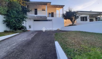 Casa com 3 quartos à venda na Rua Doutor Miguel Vieira Ferreira, 20, Petrópolis, Novo Hamburgo, 176 m2 por R$ 650.000