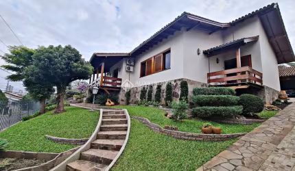 Casa com 4 quartos à venda na Rua Frederico Groehs Neto, 180, Vila Nova, Novo Hamburgo, 427 m2 por R$ 1.250.000