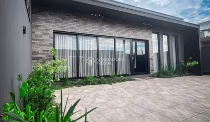 Casa com 3 quartos à venda na Poços de Caldas, 91, Oeste, Sapiranga, 270 m2 por R$ 1.200.000