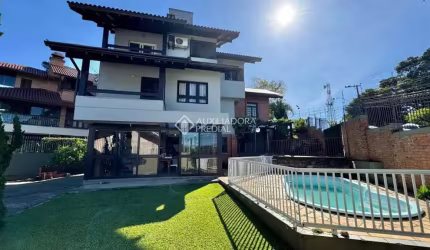 Casa com 4 quartos à venda na Guaporé, 79, Primavera, Novo Hamburgo, 304 m2 por R$ 1.099.000