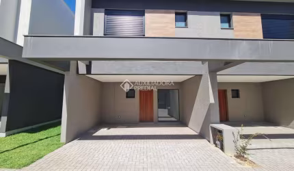 Casa em condomínio fechado com 3 quartos à venda na Rua Onze de Junho, 950, Operário, Novo Hamburgo, 128 m2 por R$ 1.219.000