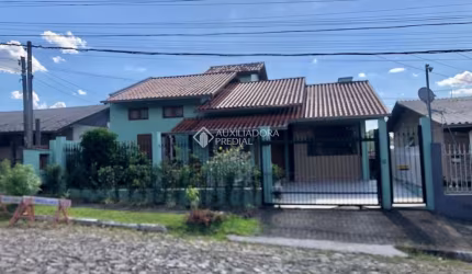 Casa com 3 quartos à venda na Chile, 63, Petrópolis, Novo Hamburgo, 115 m2 por R$ 480.000